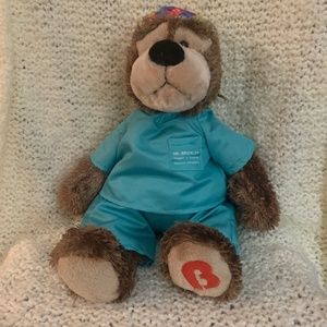Gund stuffed doctor bear in removable outfit.
